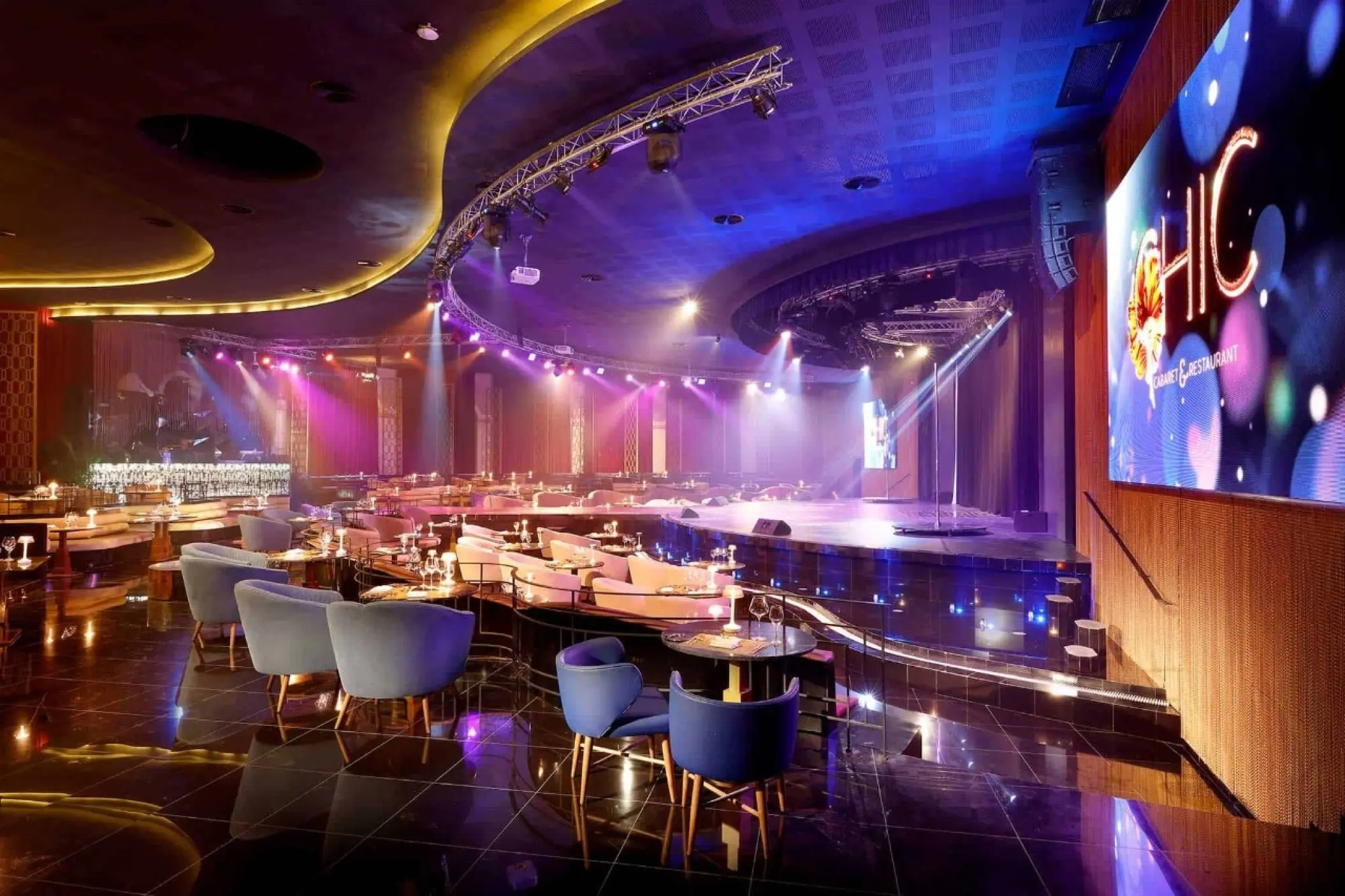 Chic Cabaret & Restaurant theater venue with stage lighting and lounge seating at TRS Yucatan, Riviera Maya