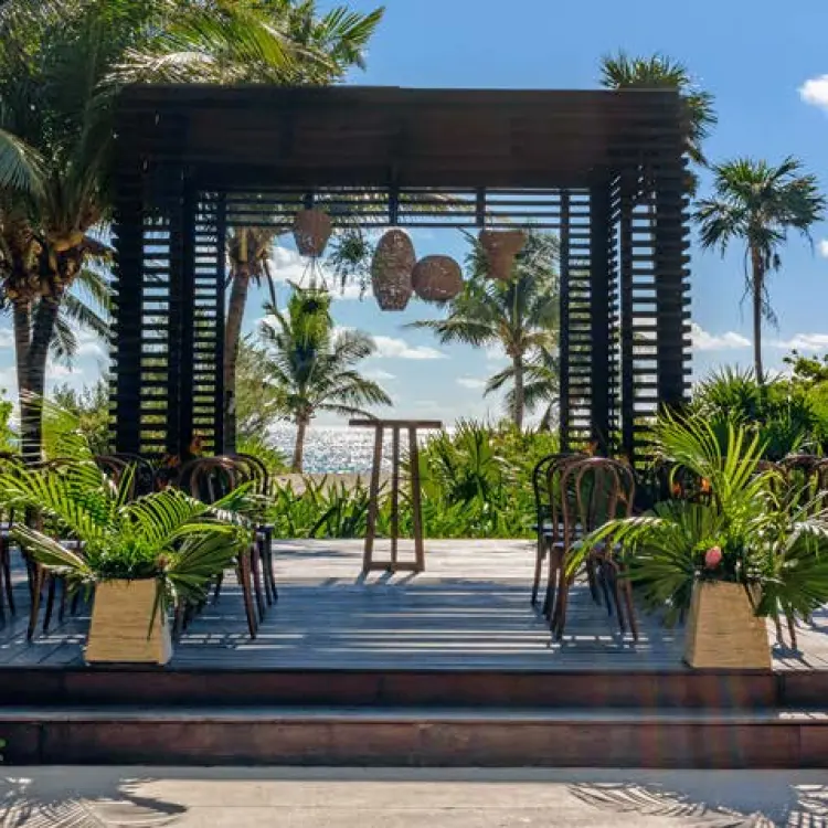 Wooden gazebo wedding ceremony setup at UNICO 20°87°, Riviera Maya