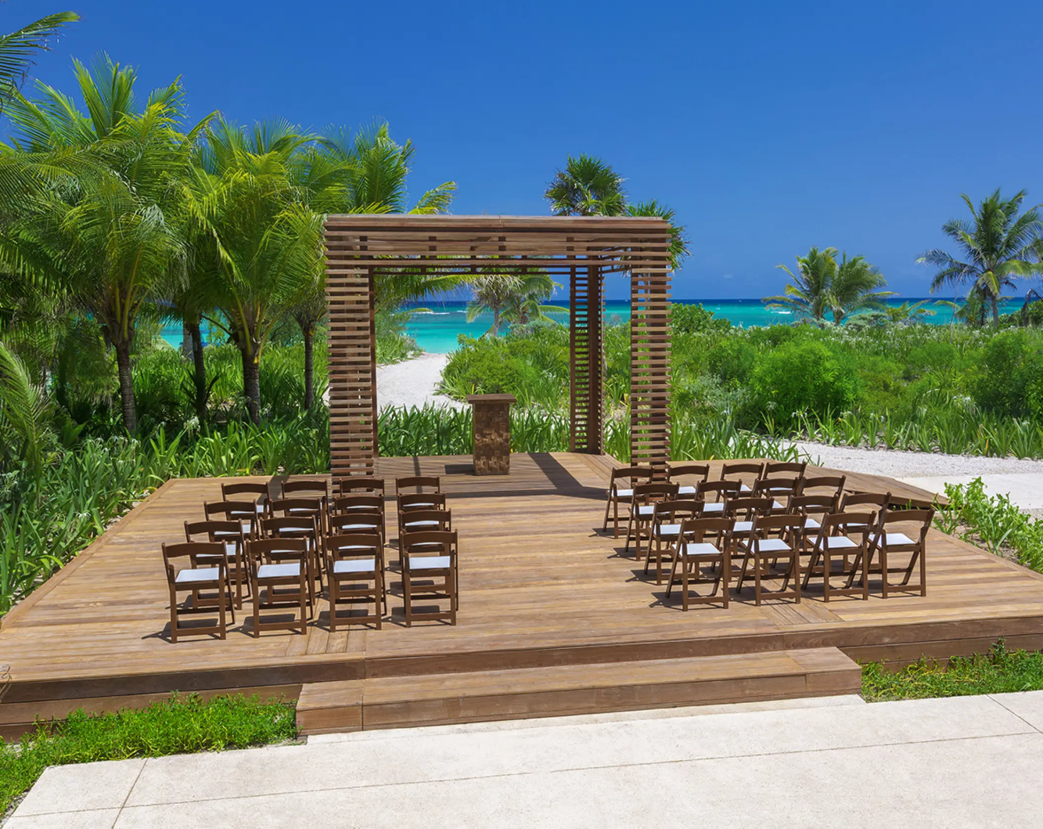 Wooden gazebo wedding ceremony setup at UNICO 20°87°, Riviera Maya