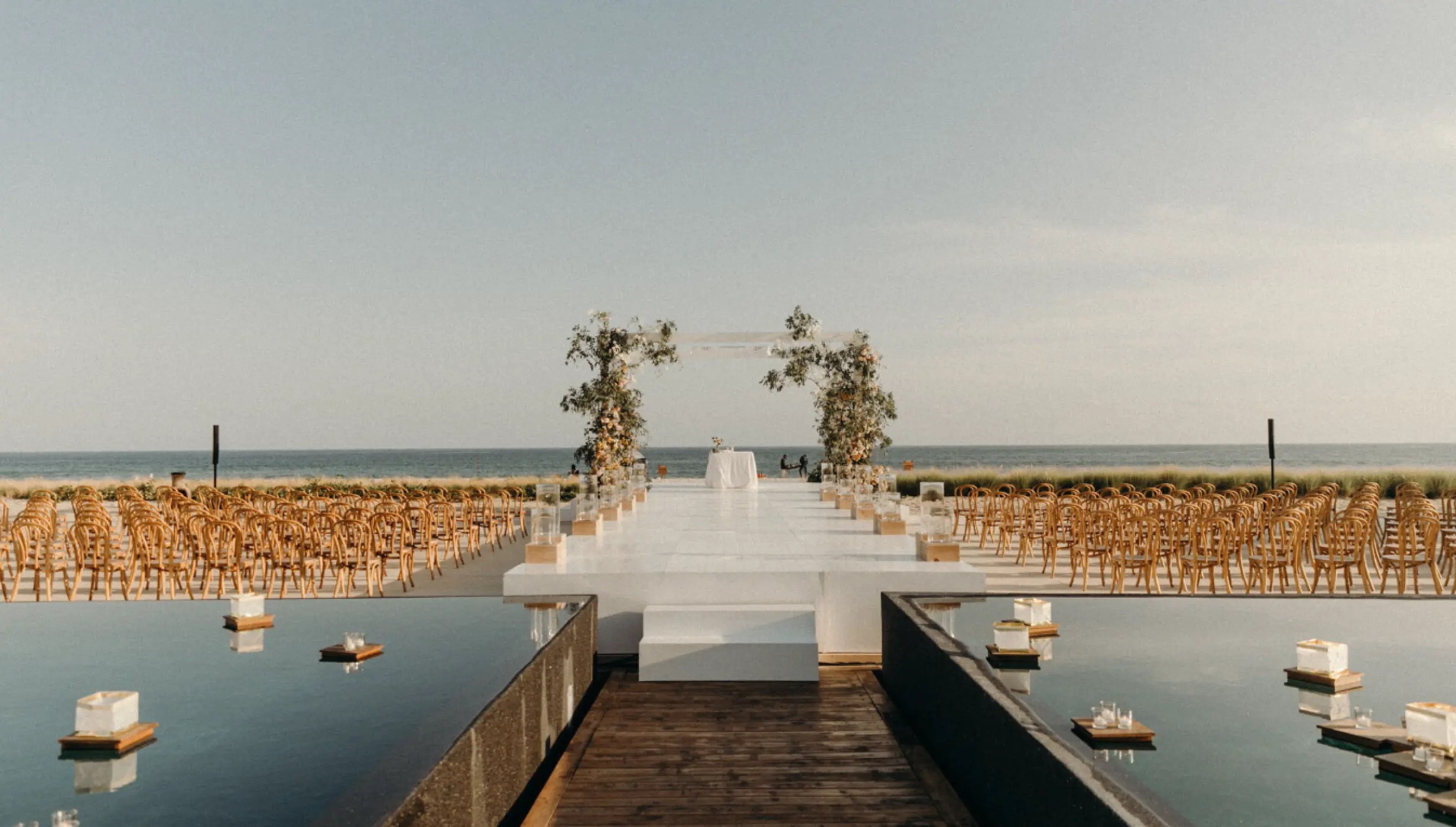 Wedding ceremony on the beach deck at Viceroy Los Cabos