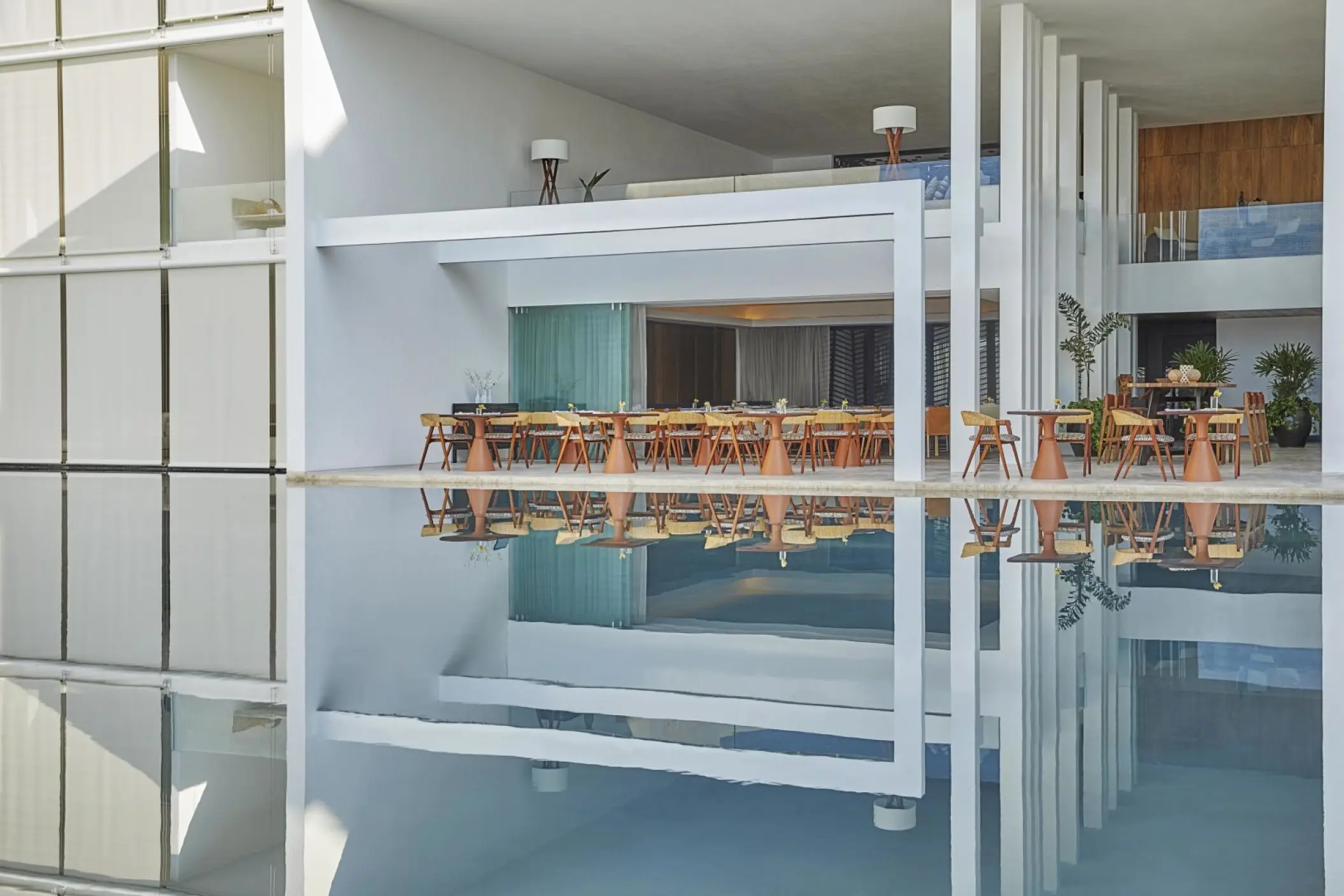 Casero restaurant at Viceroy Los Cabos with modern white architecture reflected in the water, Cabo San Lucas