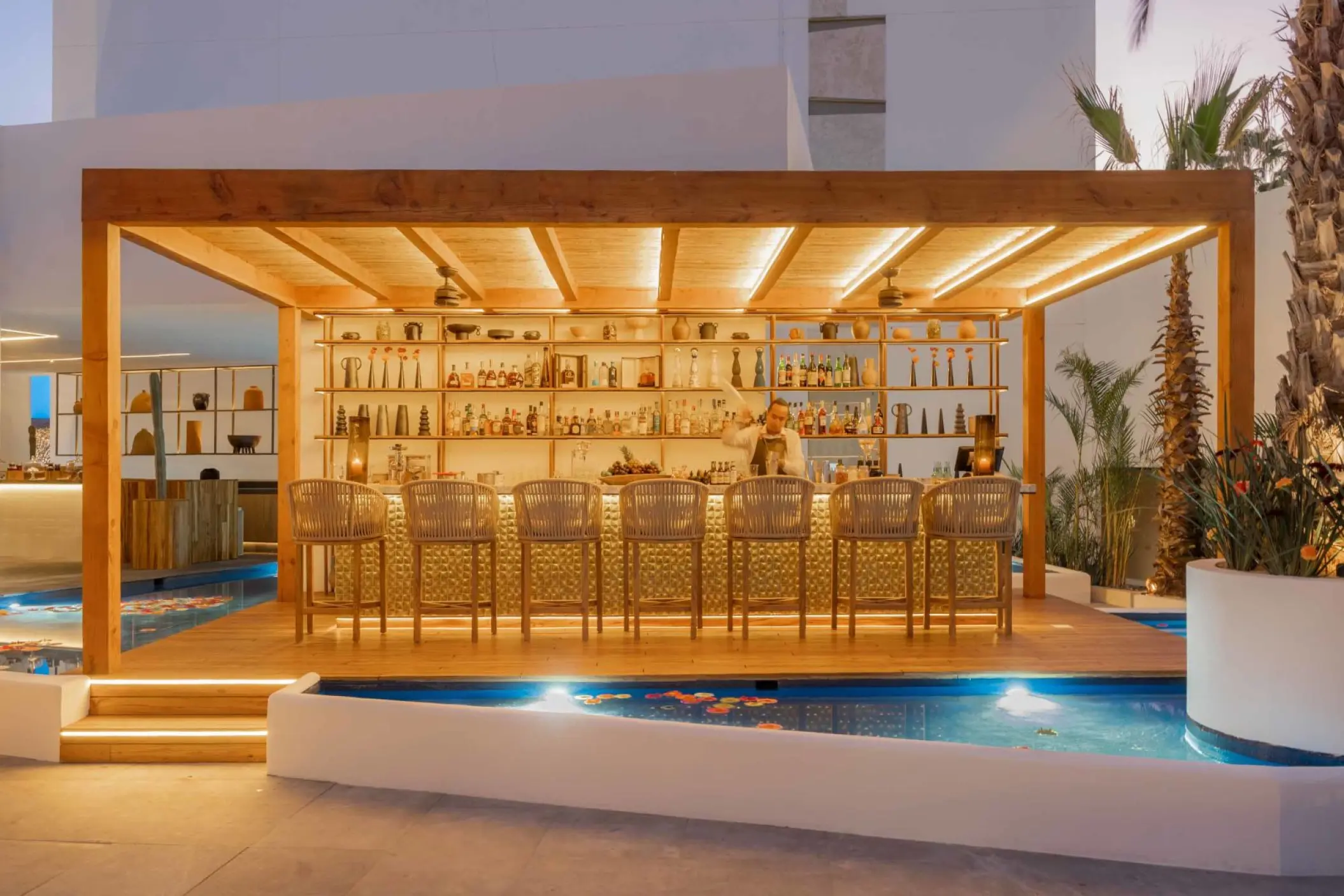 Dalia Bar under a wooden pergola at Viceroy Los Cabos, Cabo San Lucas