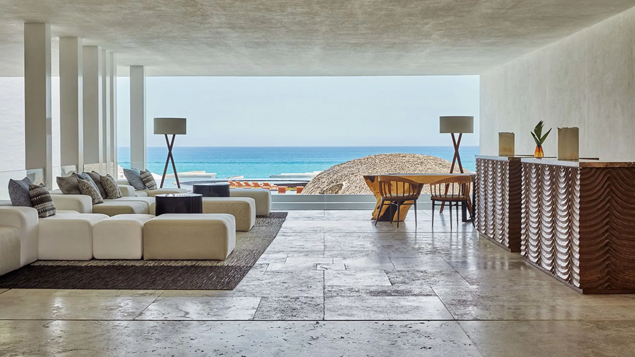 Modern open-air lobby with ocean views at Viceroy Los Cabos, Cabo San Lucas