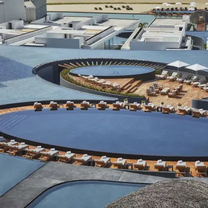 Aerial view of circular pools and modern architecture at Viceroy Los Cabos, Cabo San Lucas