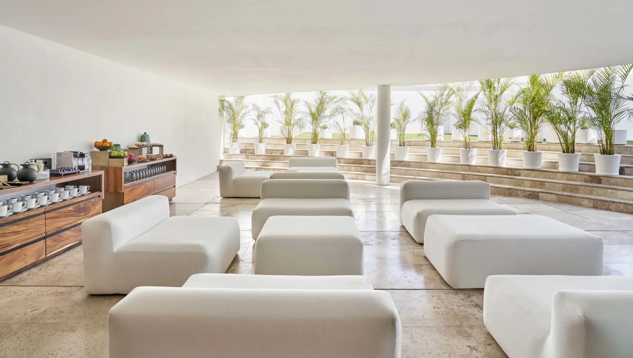 Miraflores Terrace lounge area with white seating at Viceroy Los Cabos, Cabo San Lucas