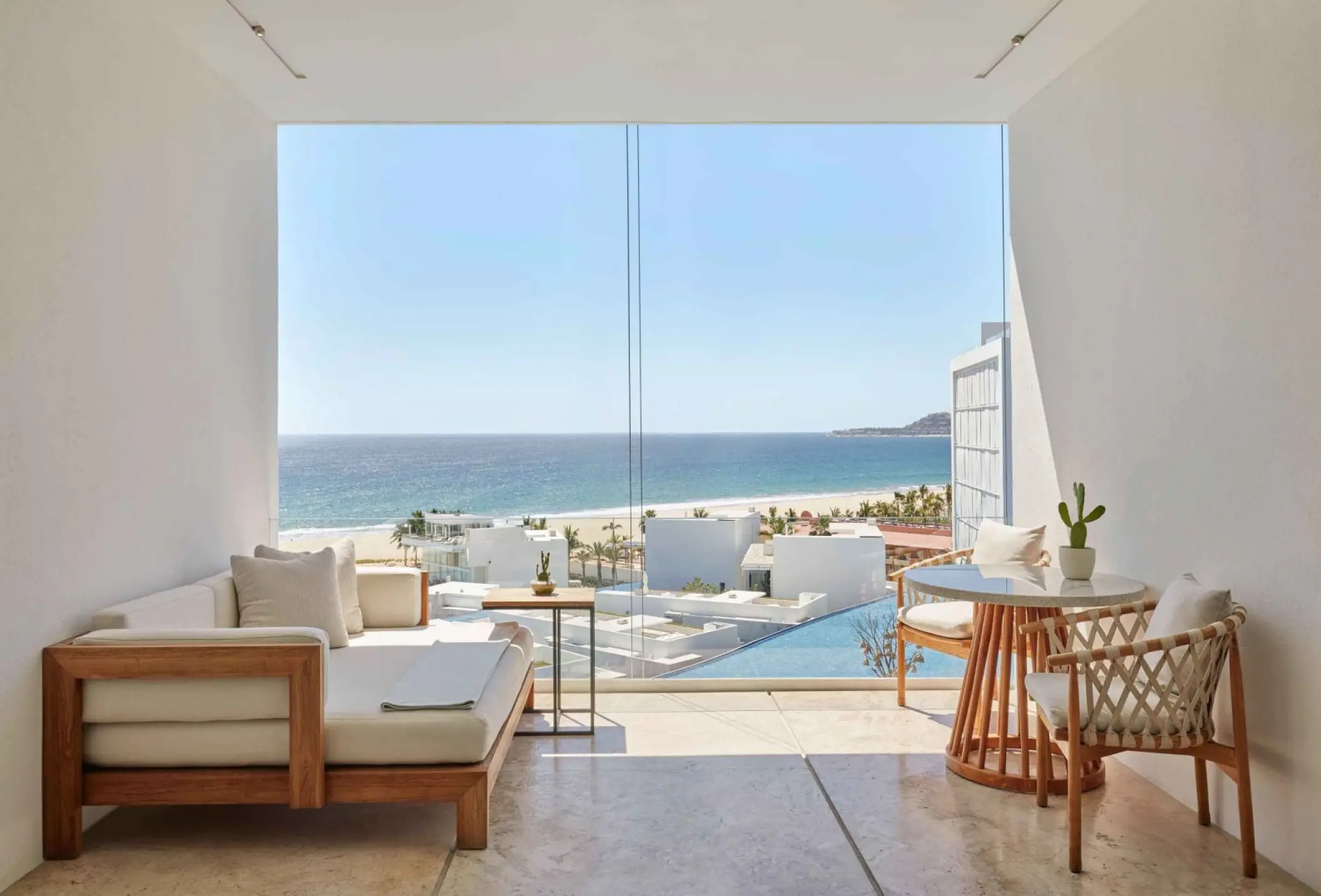 Ocean view balcony with outdoor lounge and dining furniture at Viceroy Los Cabos, Cabo San Lucas