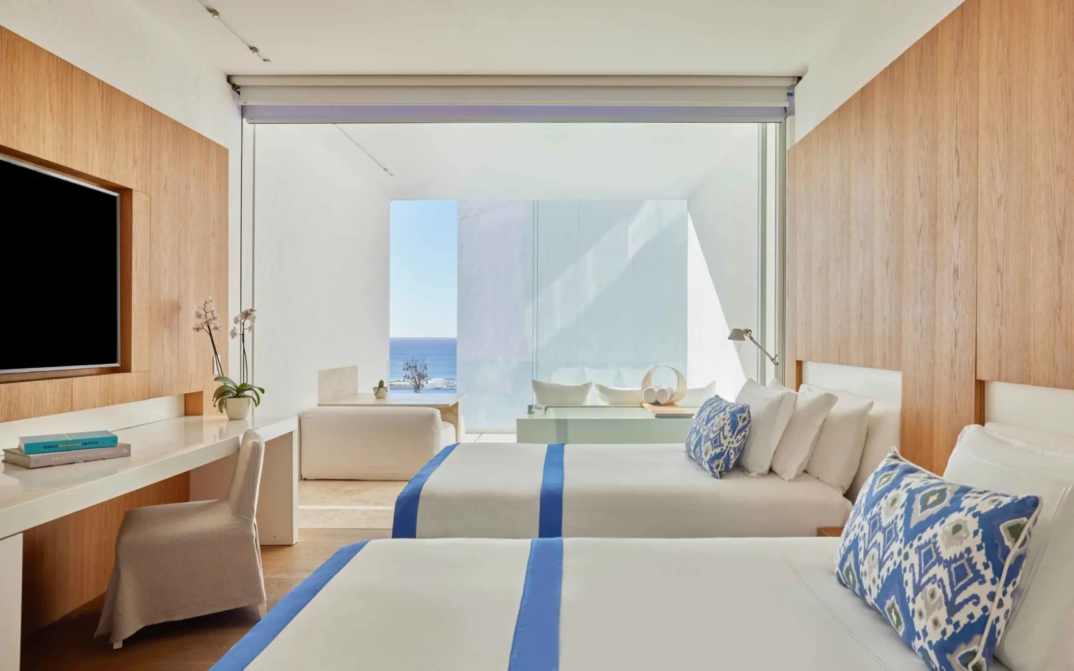 Partial ocean view guest room with two double beds at Viceroy Los Cabos, Cabo San Lucas