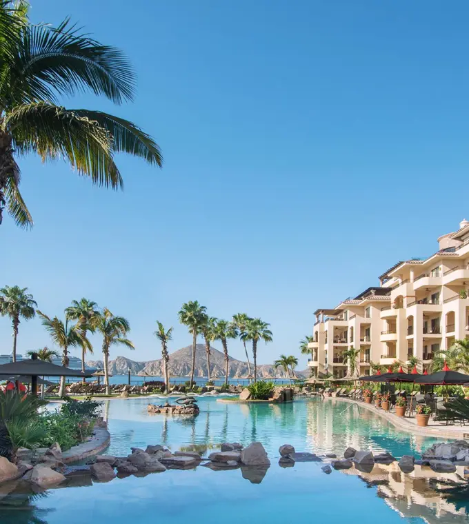 Multi-level pool complex and hacienda-style buildings at Villa La Estancia Los Cabos, Cabo San Lucas