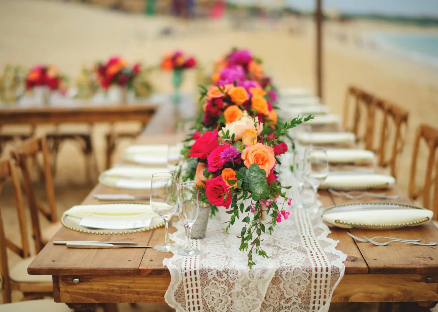 Dinner reception decor on the beach wedding venue at Villa La Estancia Los Cabos