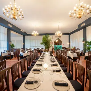 Viva Maya by Wyndham restaurant dining room with long tables and chandeliers, Playa Del Carmen