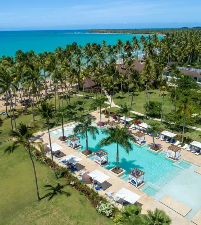 Aerial view of Viva V Samana swimming pool and palm-lined beach, Samana