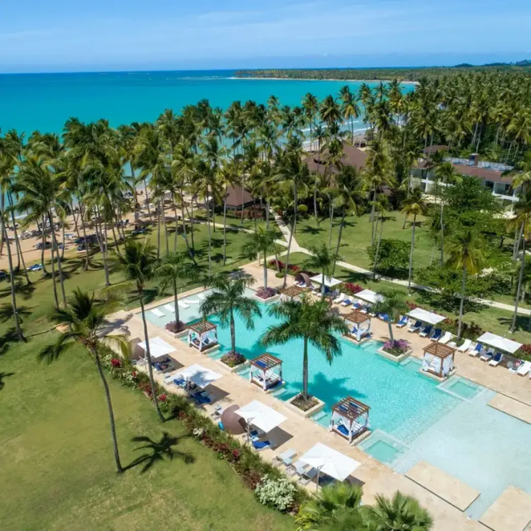 Aerial view of Viva V Samana swimming pool and palm-lined beach, Samana