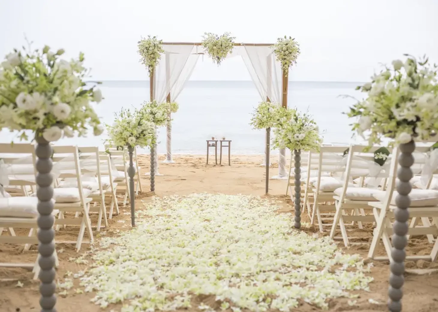 Ceremony decor on the beach at Viva Wyndham V Samaná