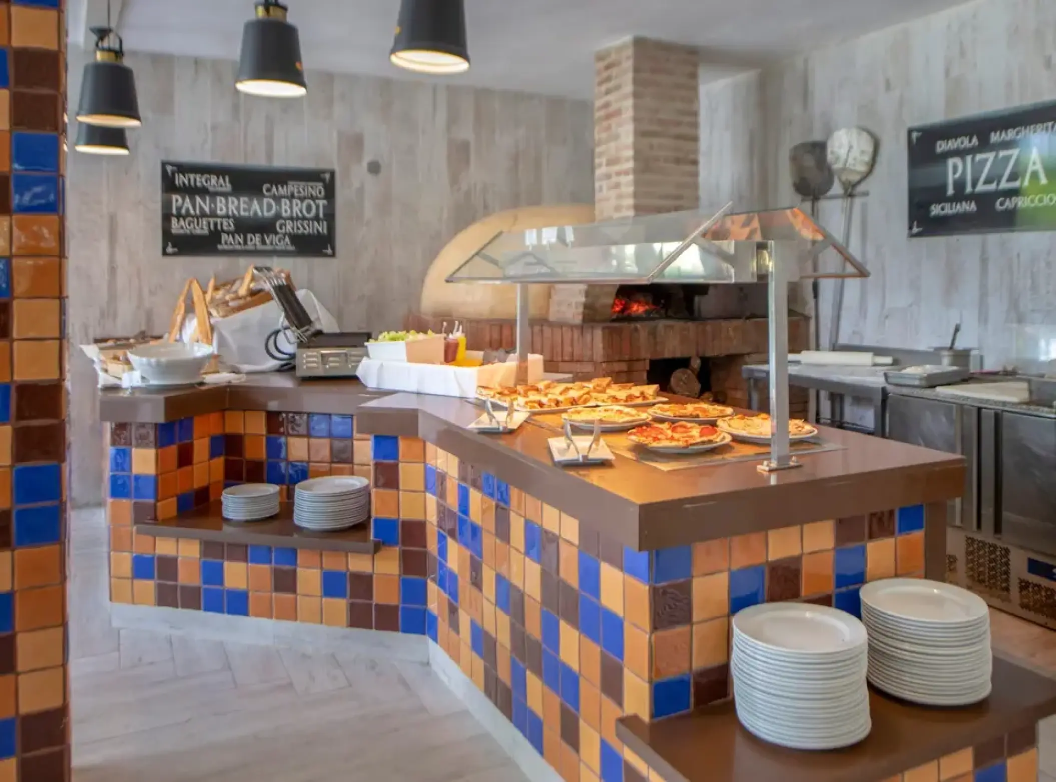 Pizza and bread buffet station at Viva V Samana, Samana