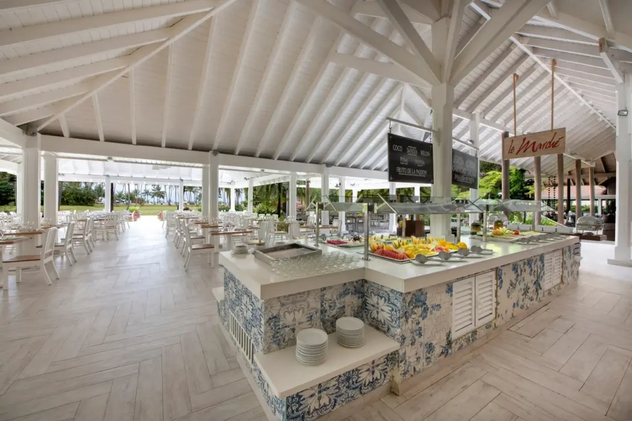 Le Marche buffet restaurant with white beamed ceilings and blue tile at Viva V Samana, Samana