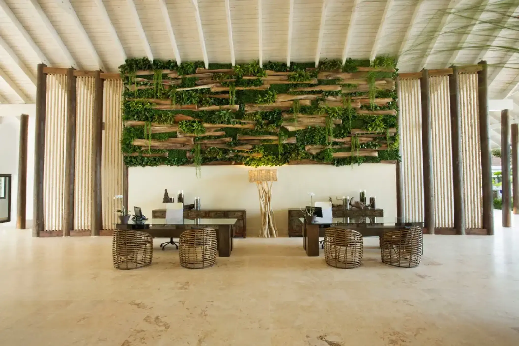 Reception area with living green wall and woven chairs at Viva V Samana, Samana