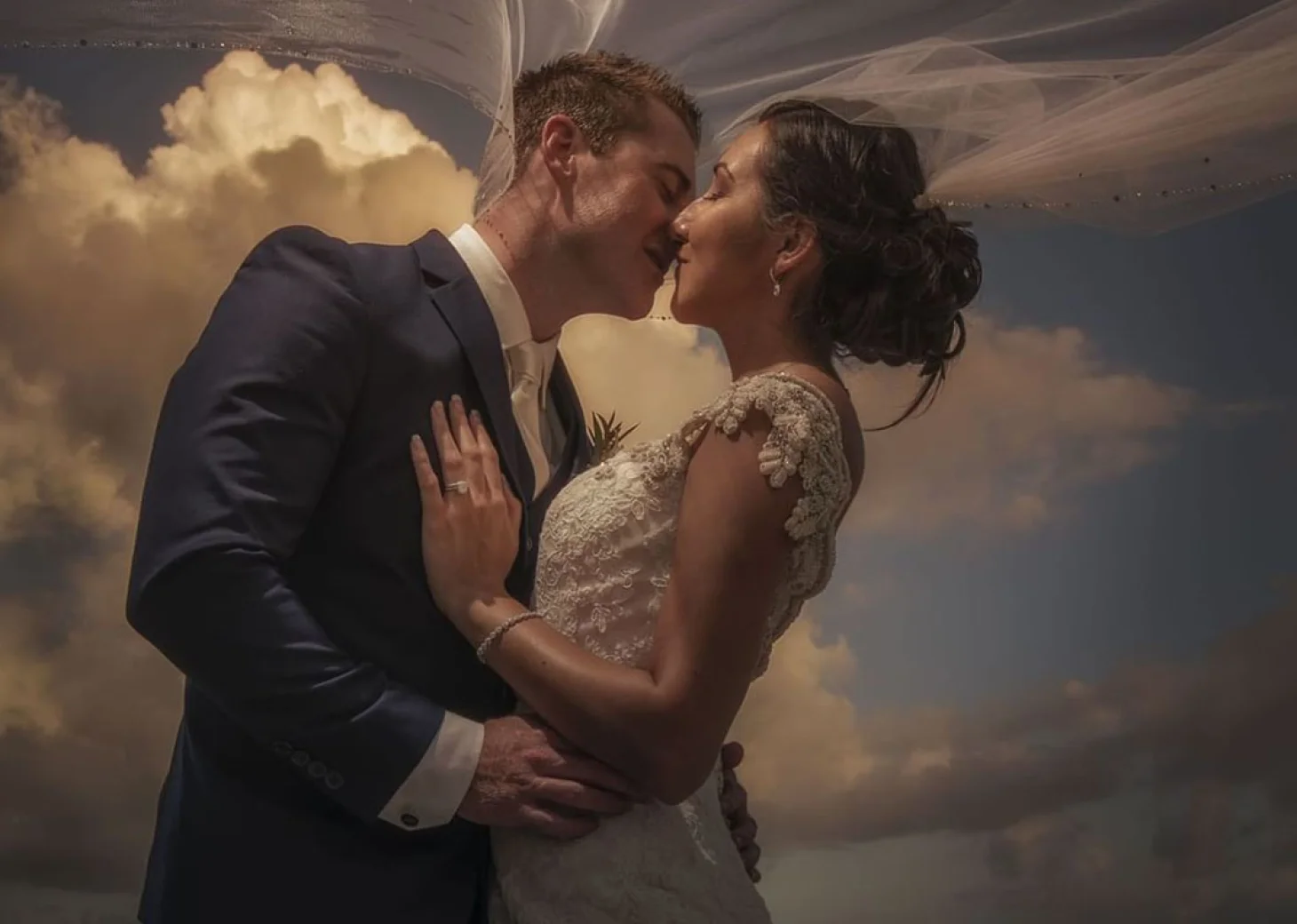 Just married couple kissing each other at Haven Riviera Cancun.