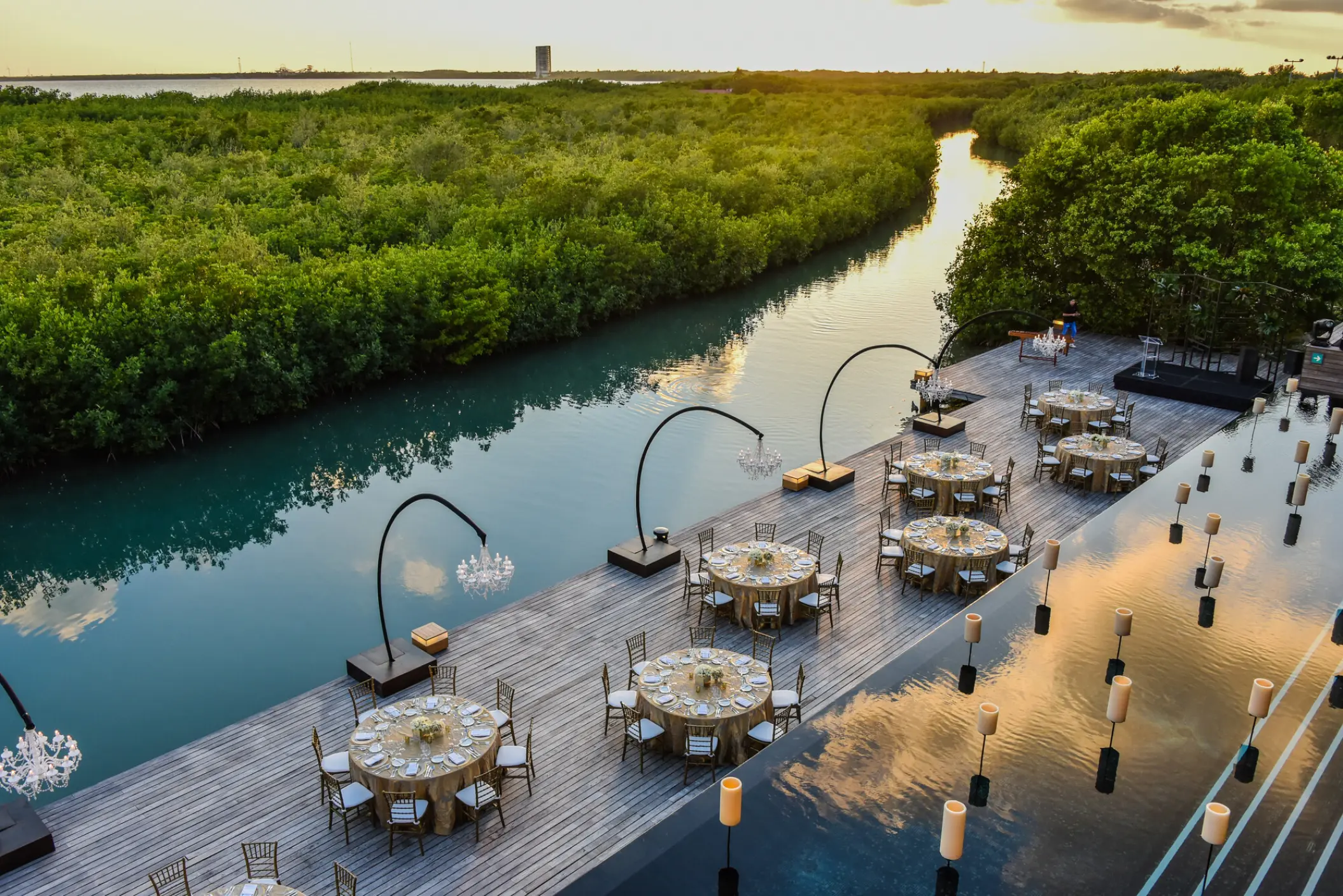 Terra Nostra wedding reception deck beside the canal and mangroves at Nizuc Resort, Cancun