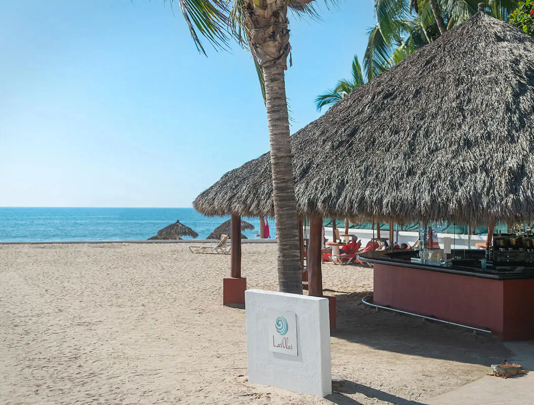 Las Olas beach bar under a thatched palapa at Wyndham Alltra Riviera Nayarit, Puerto Vallarta