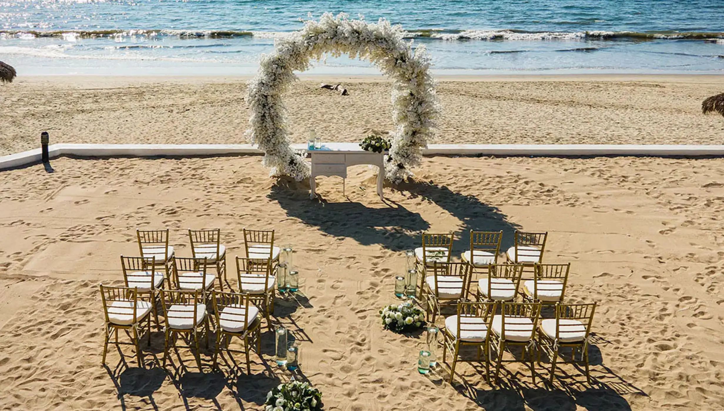 Ceremony decor on the beach at Wyndham Alltra Riviera Nayarit.
