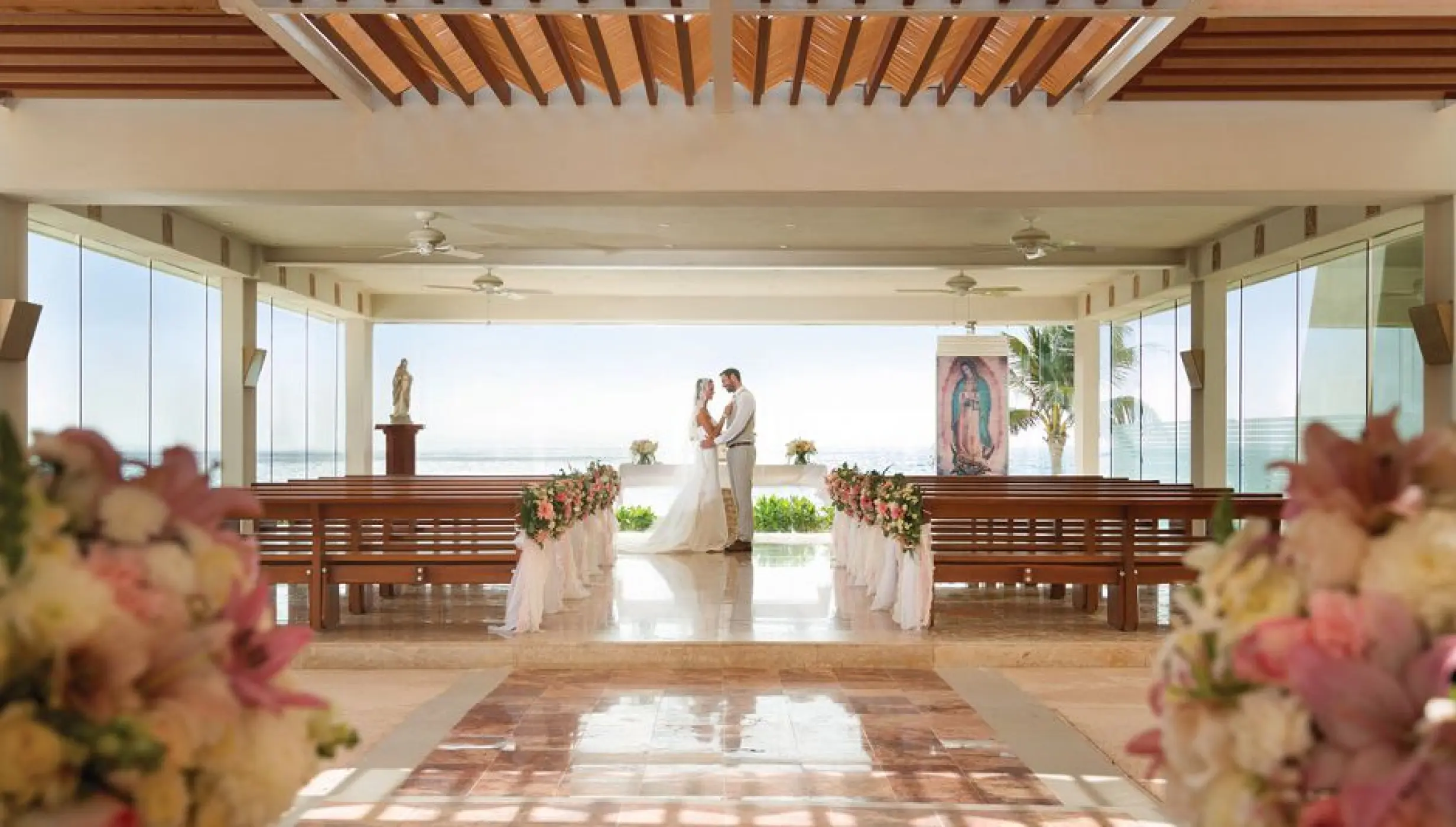 Couple at the Wyndham Alltra Cancun chapel