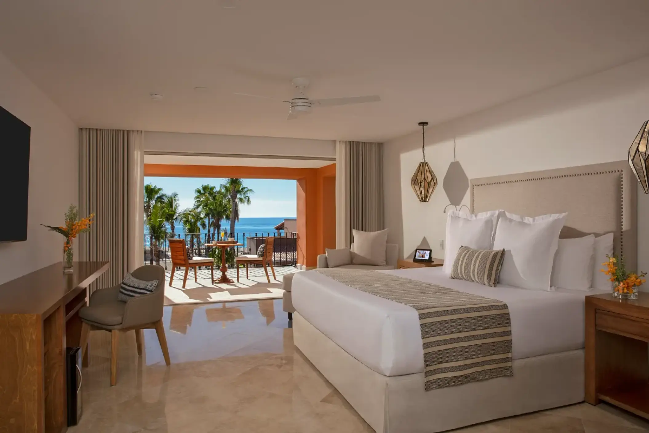 Ocean-view suite with a private balcony and king bed at Zoetry Casa del Mar, Cabo San Lucas