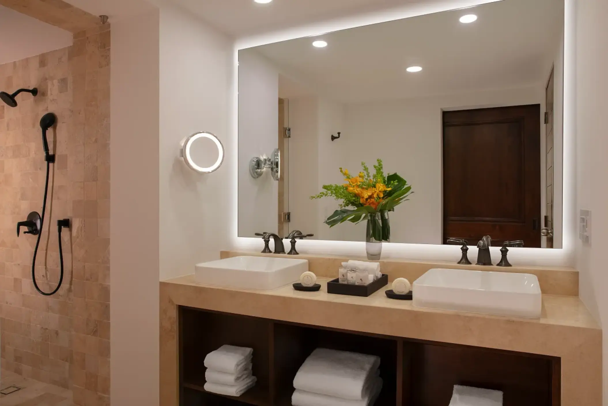 Modern suite bathroom with double vanity and walk-in shower at Zoetry Casa del Mar, Cabo San Lucas