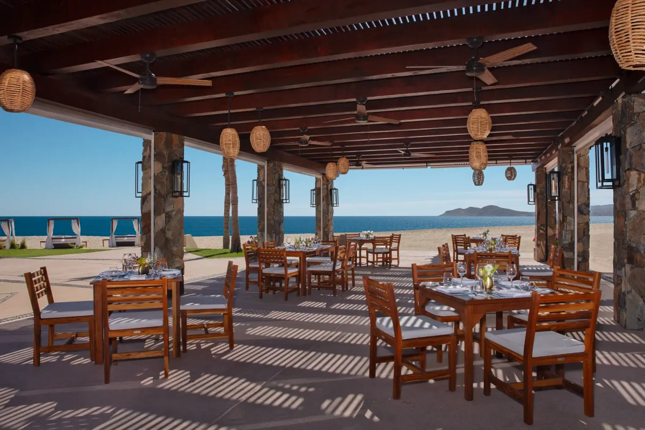 Outdoor terrace restaurant with ocean views at Zoetry Casa del Mar, Cabo San Lucas