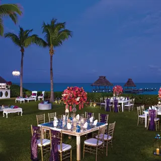 Evening wedding reception on the lawn at Zoetry Paraiso de la Bonita, Riviera Maya