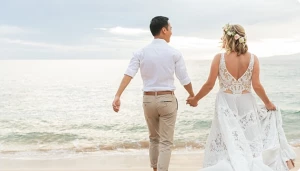 beach wedding couple hand-in-hand