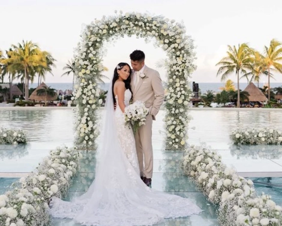 overwater wedding couple in Mexico