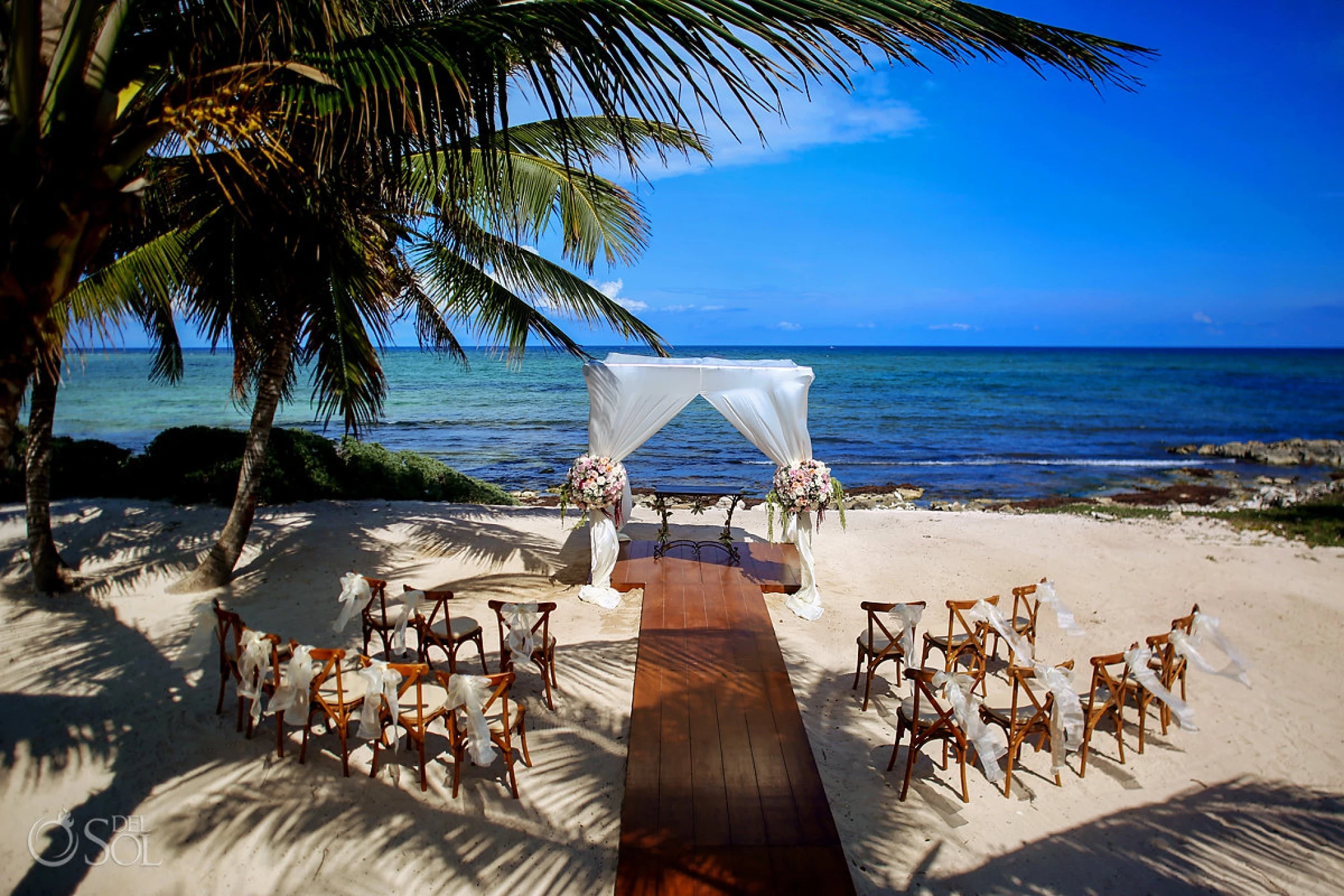 Ceremony decor in labna beach venue at akumal bay beach and wellness resort