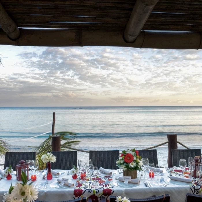 Beachfront dinner reception at akumal bay beach and wellness resort