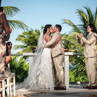 Groom and bride first kiss