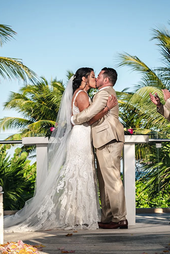 Groom and bride first kiss