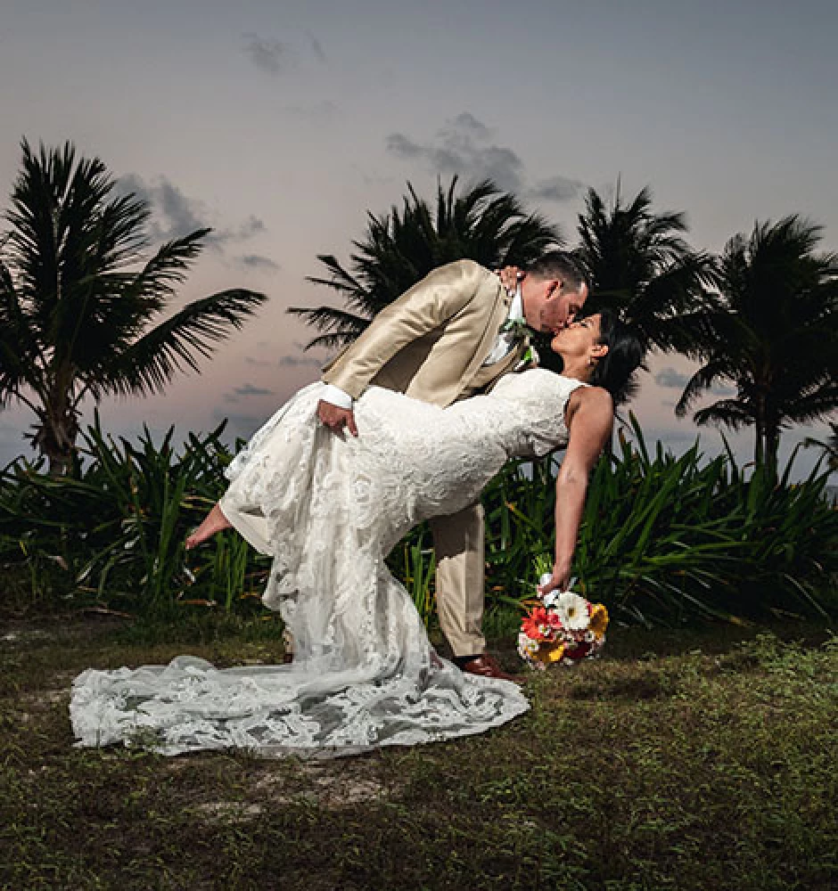 groom and bride deep kiss