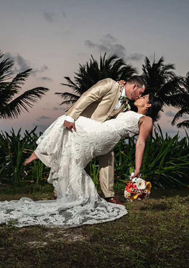 groom and bride deep kiss