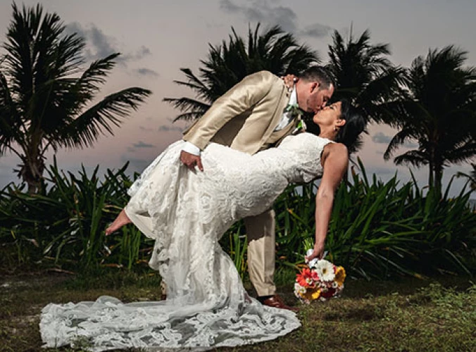 groom and bride deep kiss