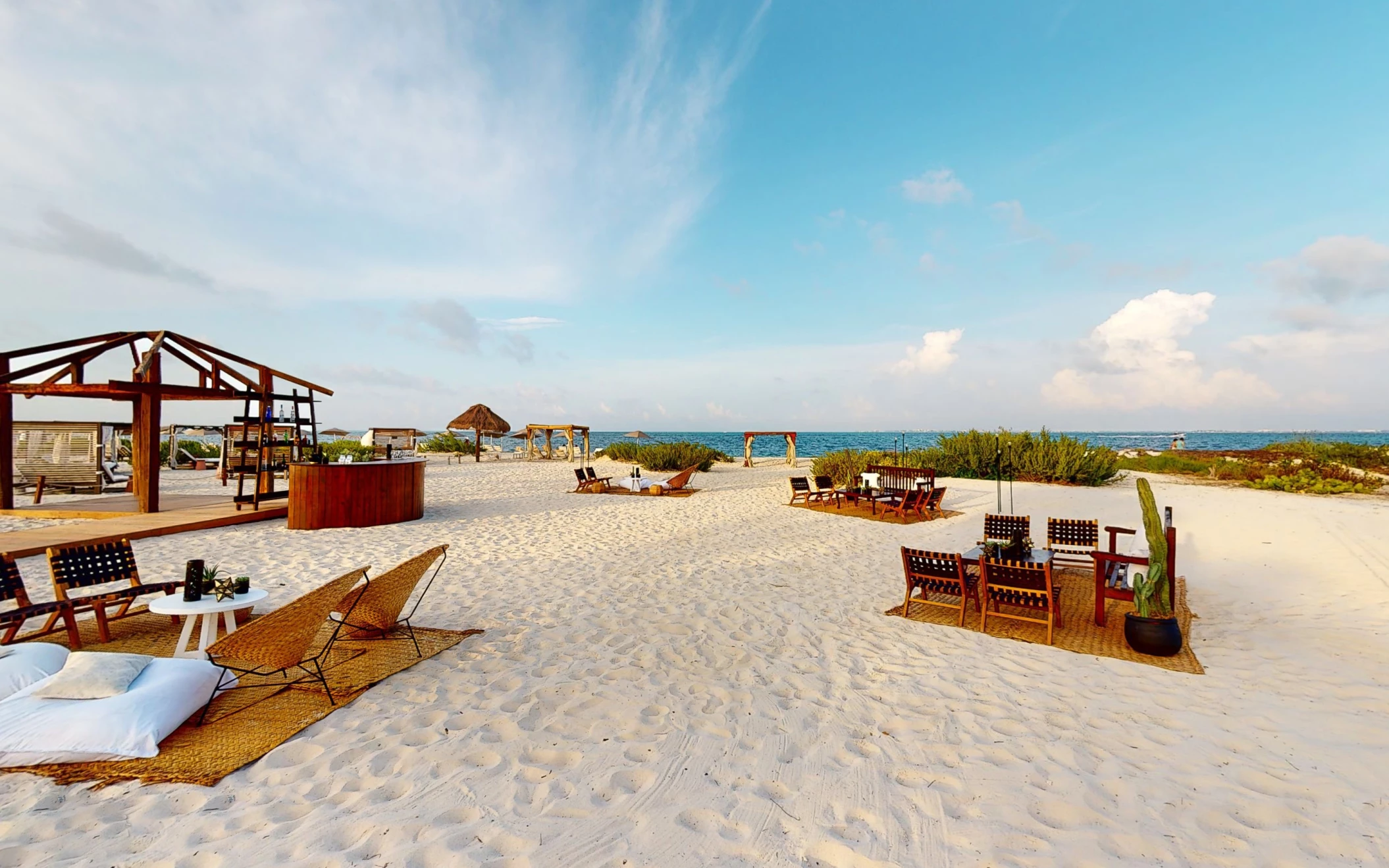 Cocktail party in beach venue at atelier playa mujeres resort