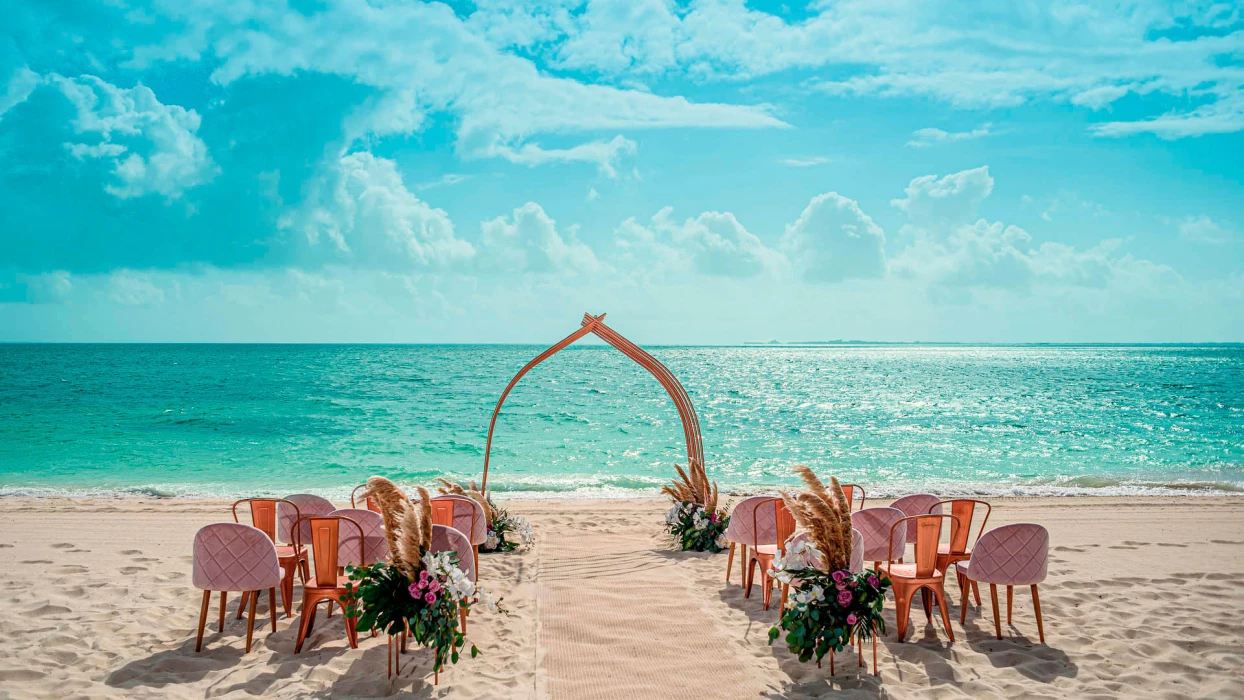 Wedding decor in beach venue at atelier playa mujeres resort