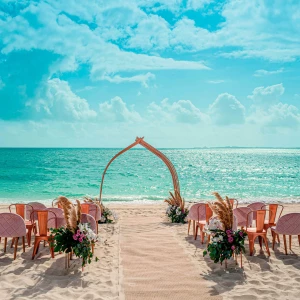 Wedding decor in beach venue at atelier playa mujeres resort