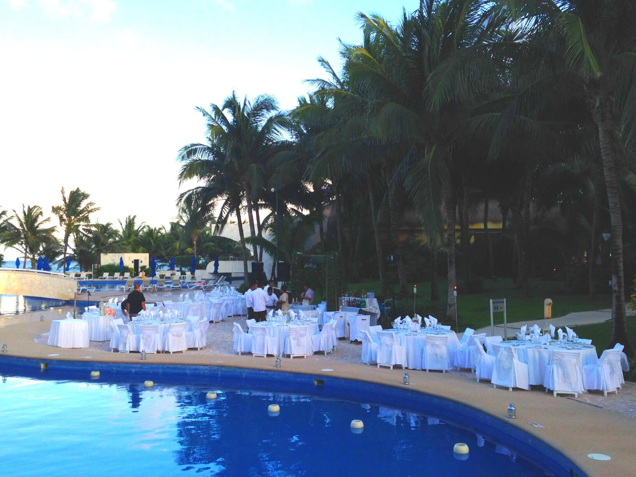 Dinner reception in Pool deck venue at Azul Beach Resort Riviera Cancun