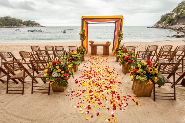 Symbolic ceremony in beach venue at barcelo maya beach