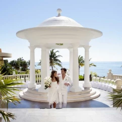 Couple in gazebo venue at Barcelo Maya beach resort