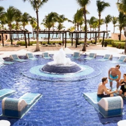 Barcelo Maya Palace pool people sitting