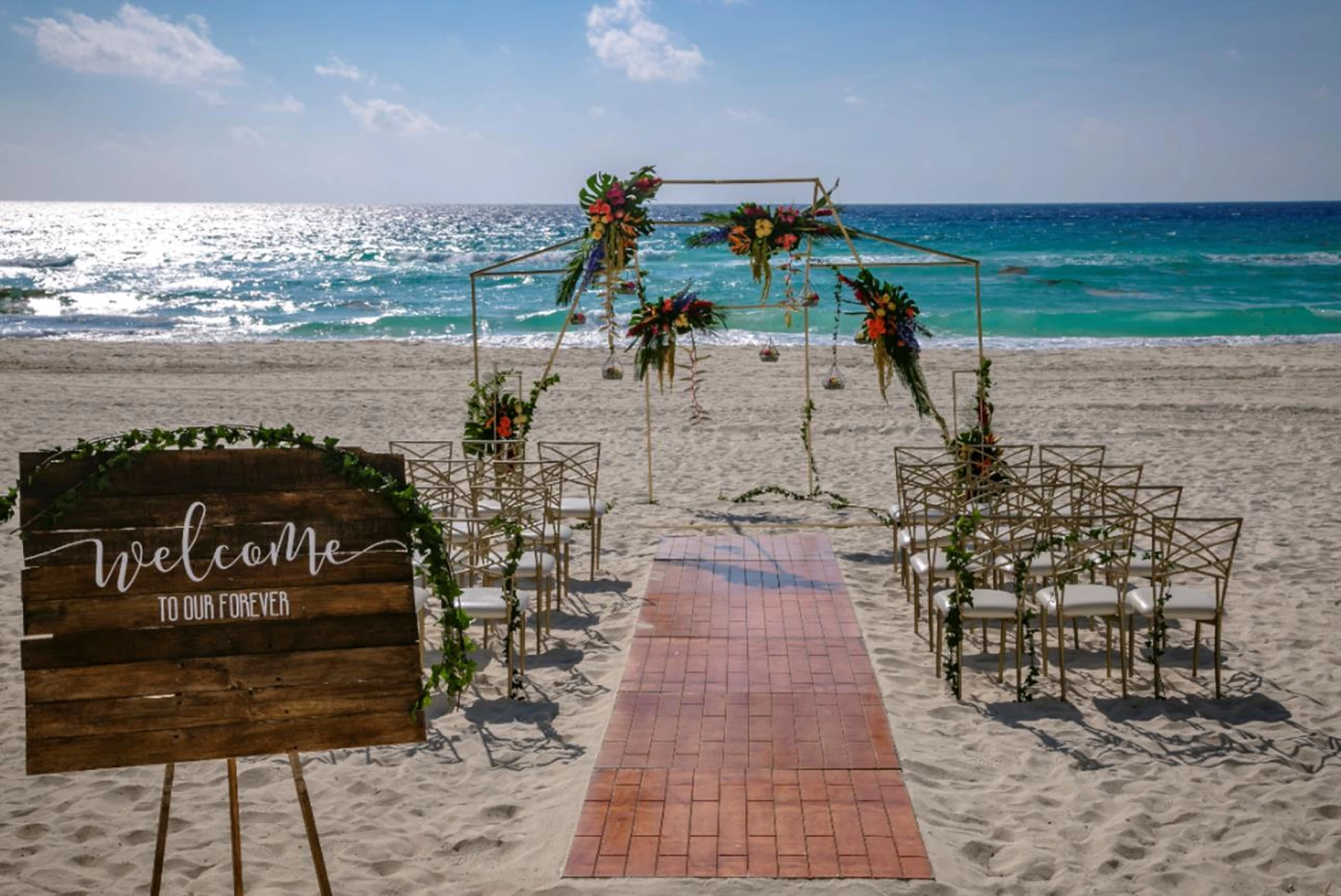 Ceremony decor on the beach wedding venue at Paradisus Cancun