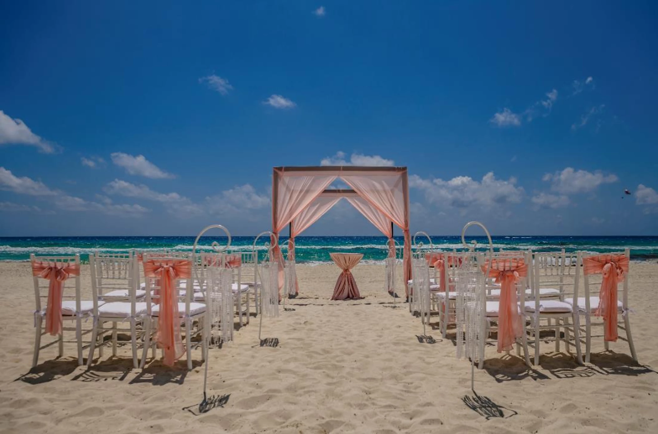 Ceremony decor on the beach wedding venue at Paradisus Cancun