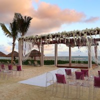 Breathless Riviera Cancun beach wedding with seats and altar