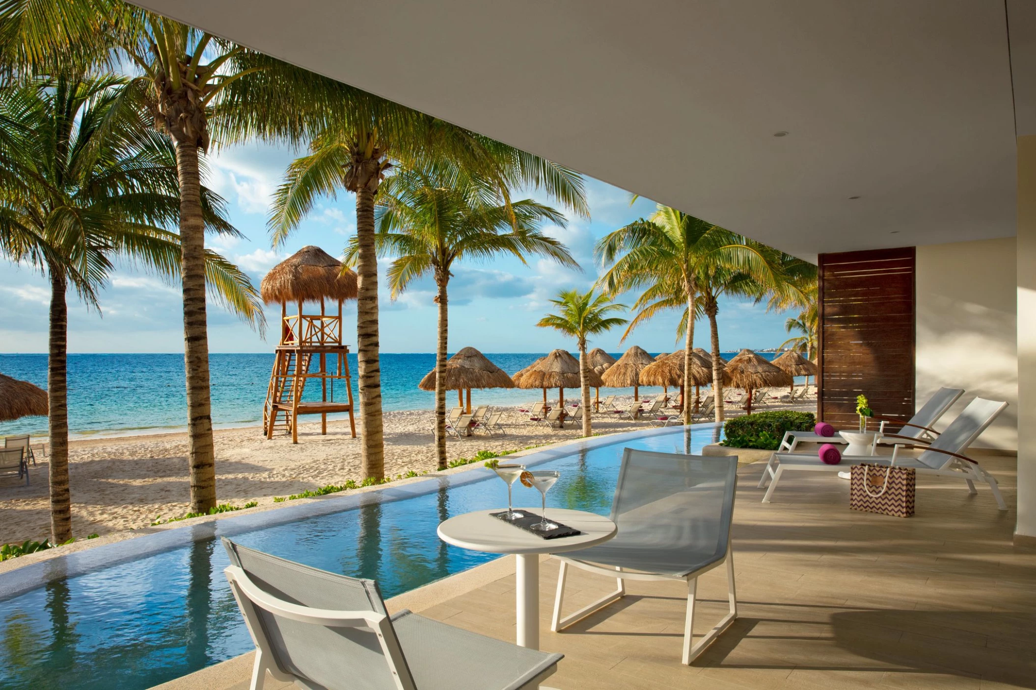 Breathless Riviera Cancun beachfront room terrace swimup