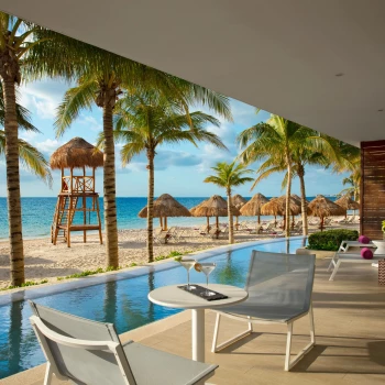 Breathless Riviera Cancun beachfront room terrace swimup